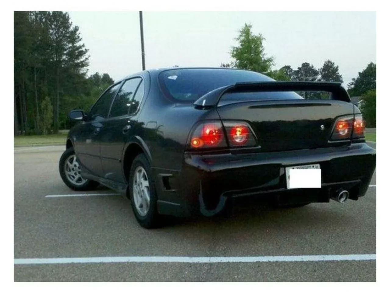 Spyder Nissan Maxima 97-99 Euro Style Tail Lights – Black